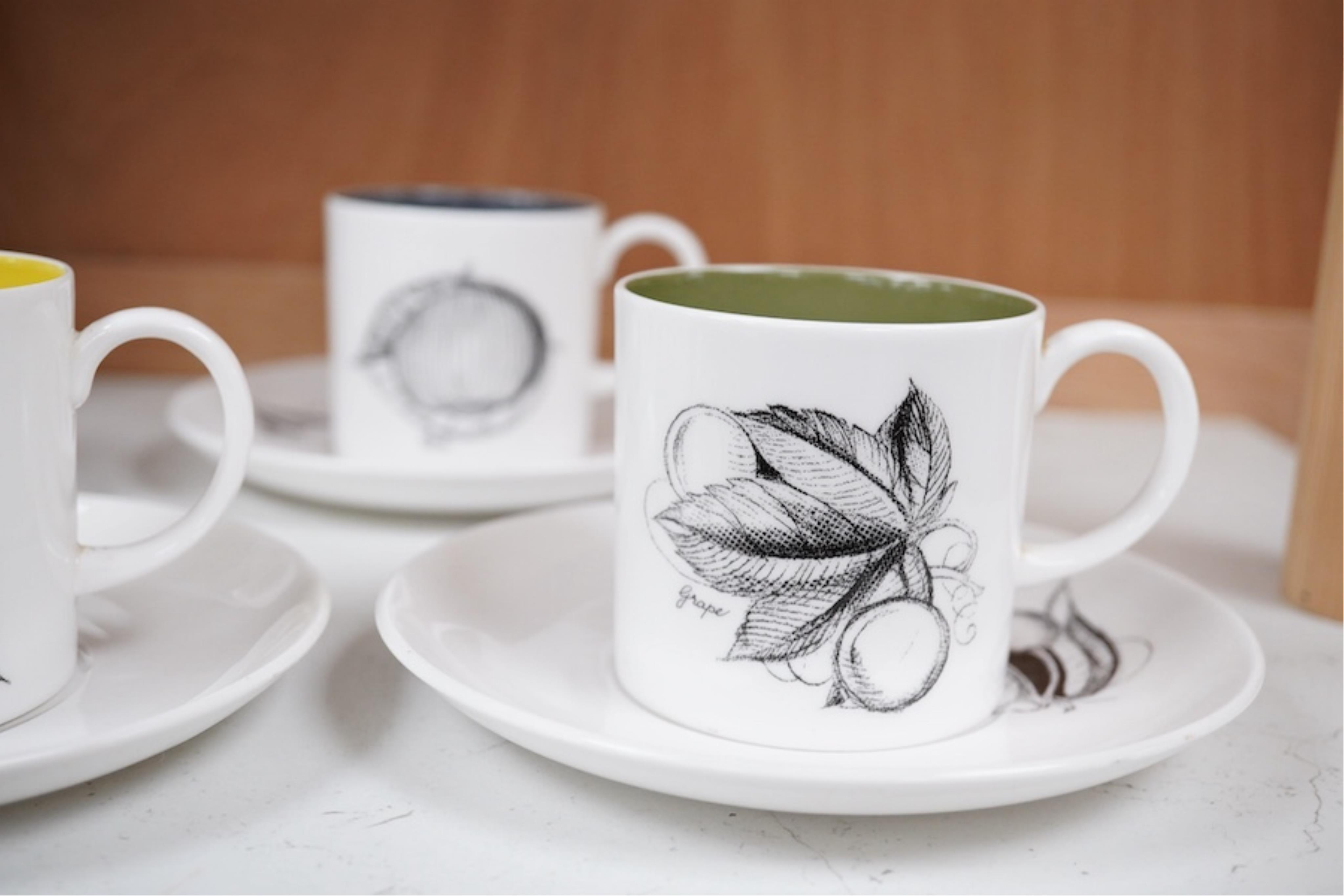 A Susie Cooper ‘Strawberry Black Fruits’ part coffee set with cake plate. Coffee pot 20cm high. Condition - one cup chipped on rim.